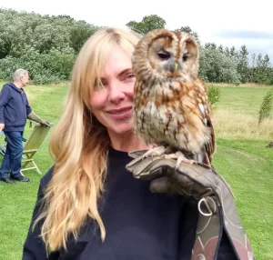About Us 2 A celebrity visit form an East Enders star. Enjoying some time with ||Fletcher our friendly Tawny Owl (Strix aluco)
