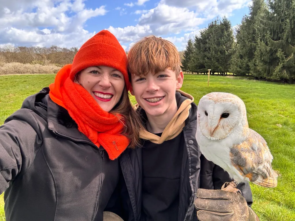 Alders product images layers Mother and son with July;iet the Barn Owl on their falconry experience london