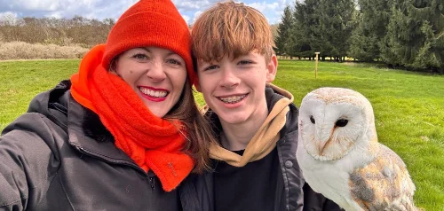 Family private falconry sessions Mum and son with a barn owl